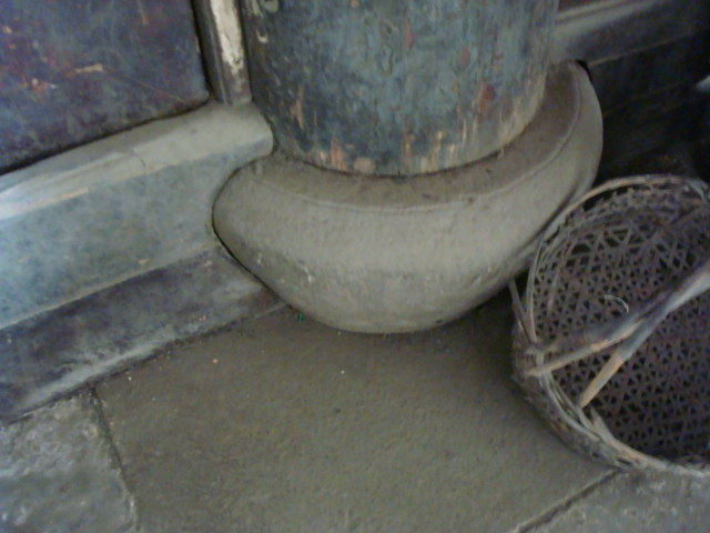Column base stone.  Qing dynasty home in downtown Wuxi,  Jiangsu,  China
