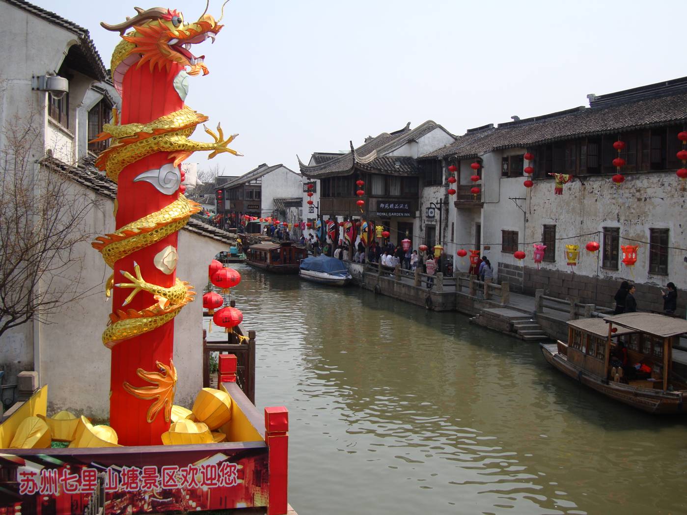 Picture:  A colourful dragon decorates the bank of the Suzhou canal.