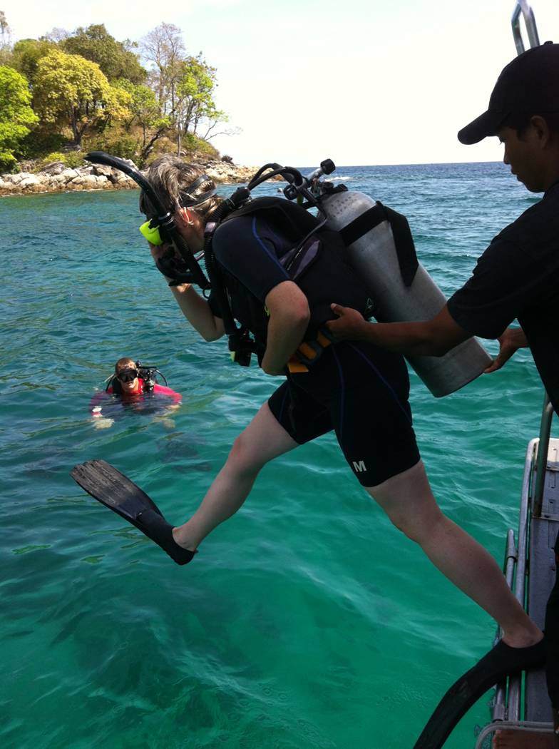 Picture:  Ruth takes the big step into the water for her first dive of the day with Dive Asia, Phuket, Thailand