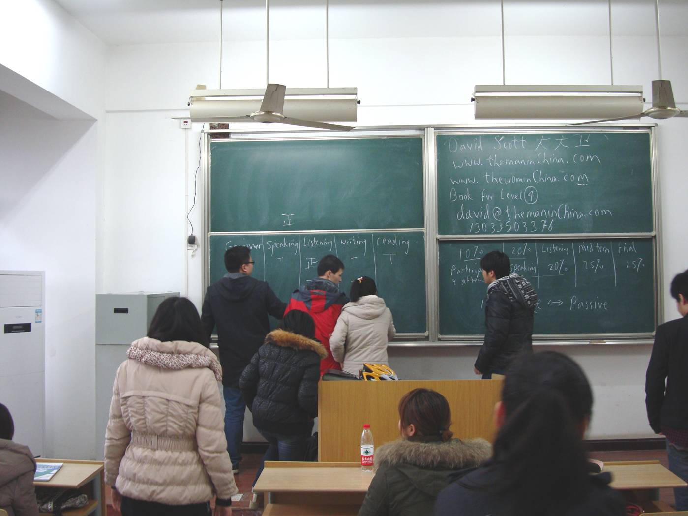 Picture:  My students head for the blackboard to vote in a class poll.  Jiangnan University, Wuxi, China