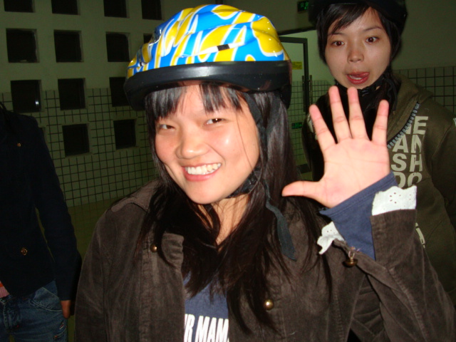 I must get this girl's name.  She's wearing her new bike helmet.  Jiangnan University,  Wuxi,  China