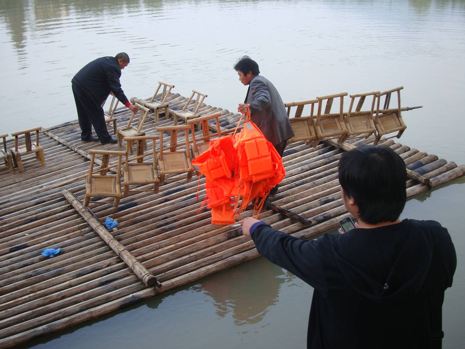 Picture:  Chairs and life jackets are placed for our river rafting adventure.  Zhejiang Province, China