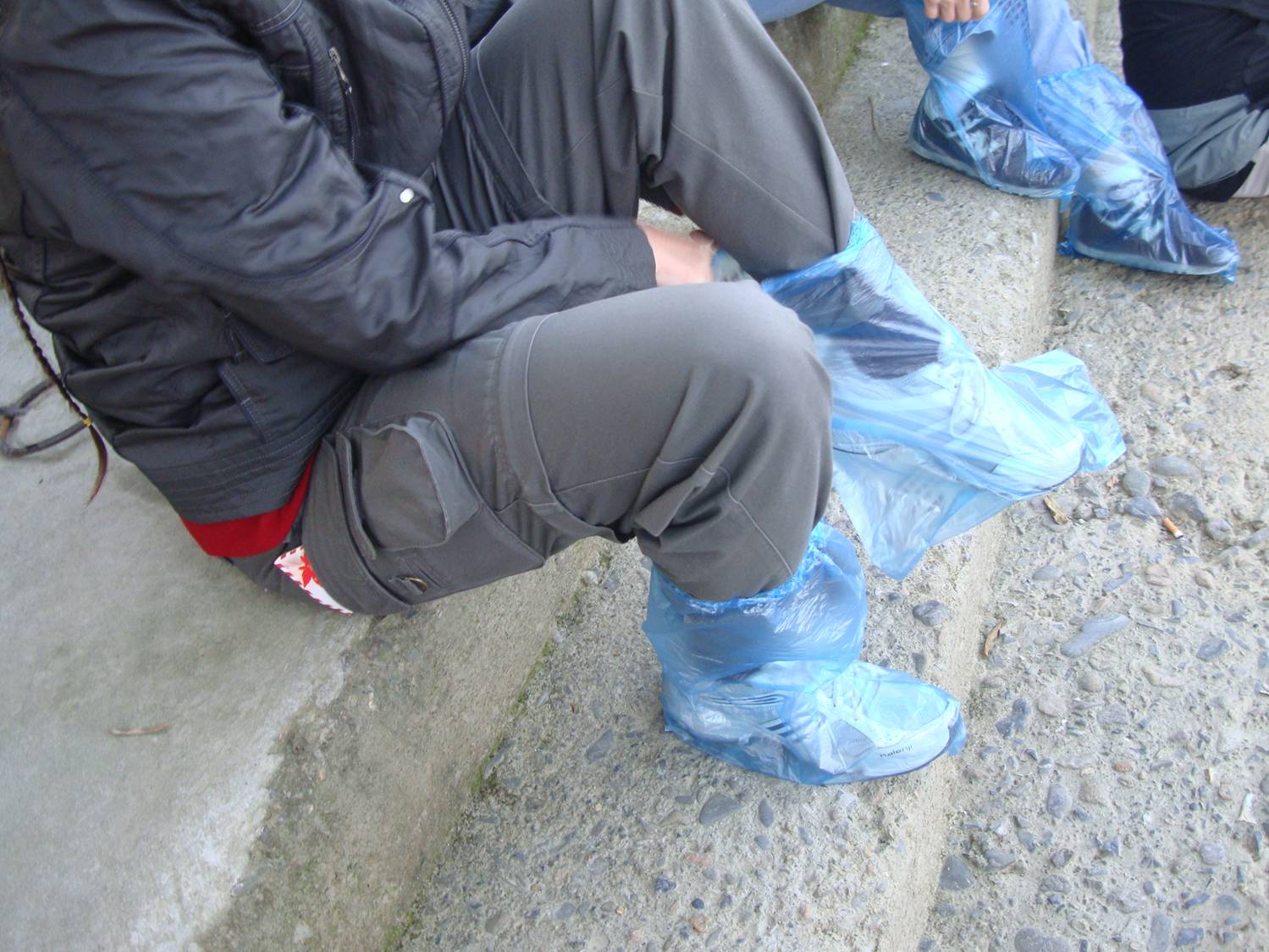 Picture:  The bags were too small for my foreigner feet, and very fragile.  This meant I had to keep my feet out of the water.  Zhejiang Province, China