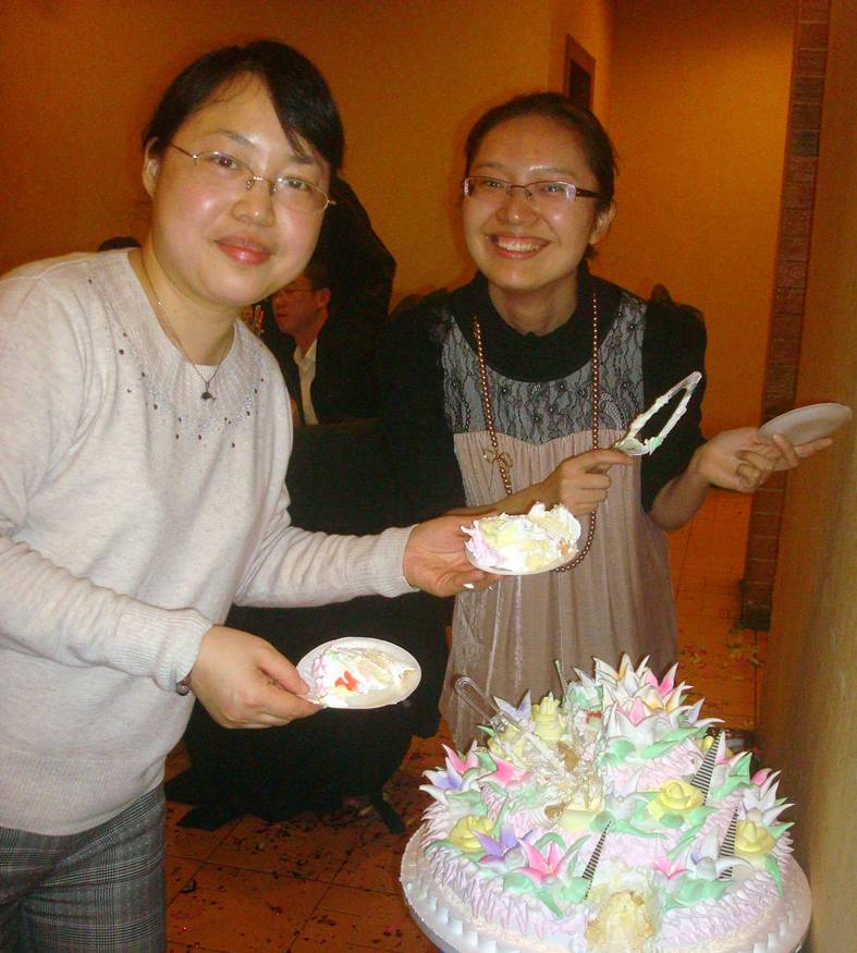 Picture:  Cherry and Jesse at the wedding cake.  Shitang Cun, Wuxi, China