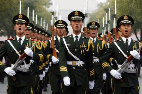 Picture:  Chinese officers marching.  Doesn't look scary to me.