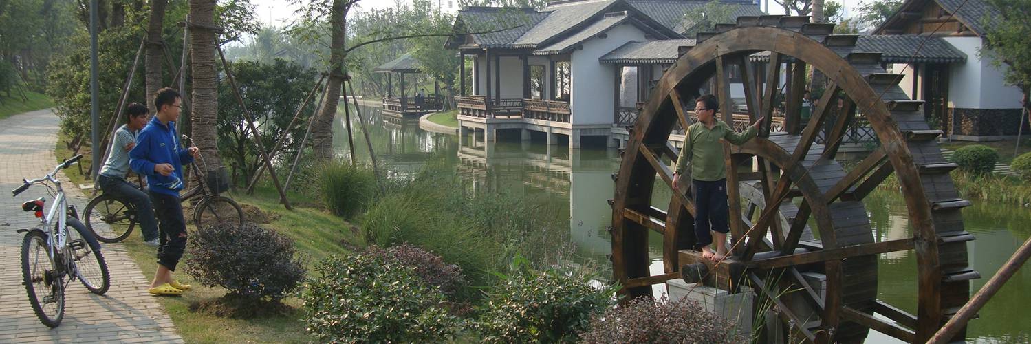 picture:  Kids at play on the waterwheel in the new canal side park to the East of Jiagnan University campus.  Wuxi, China