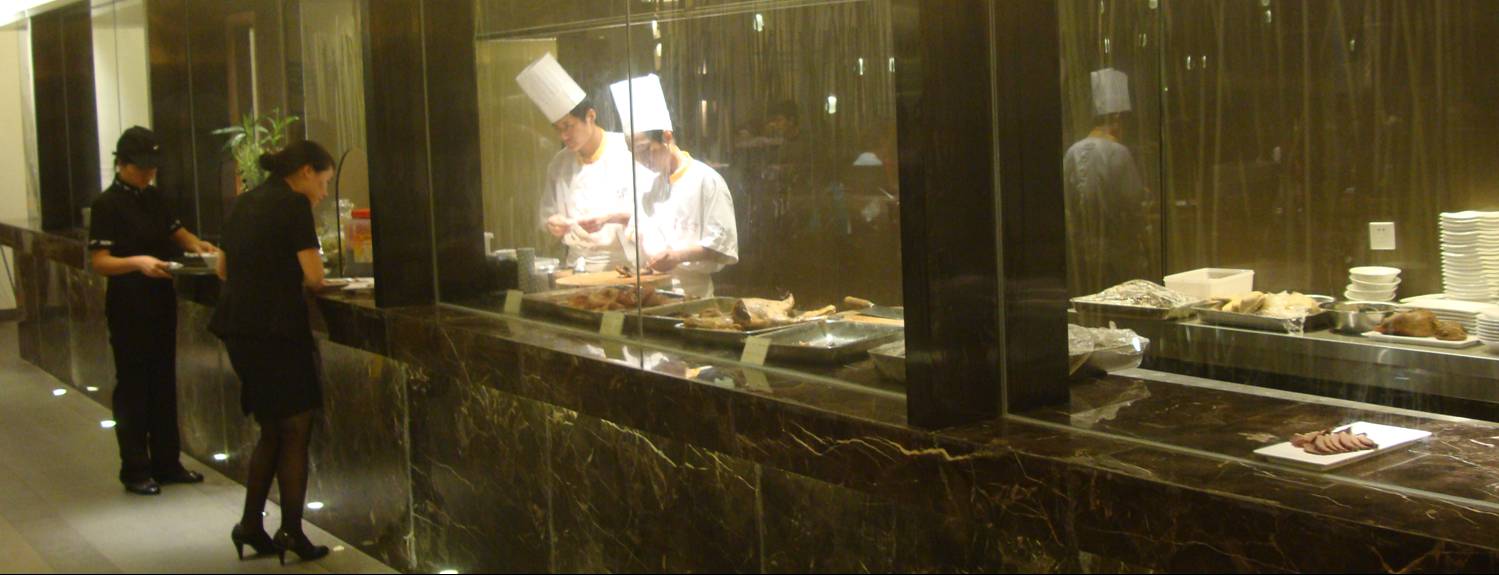 picture:  The display kitchen in one of the many restaurants in the new shopping mall.  Wuxi, China