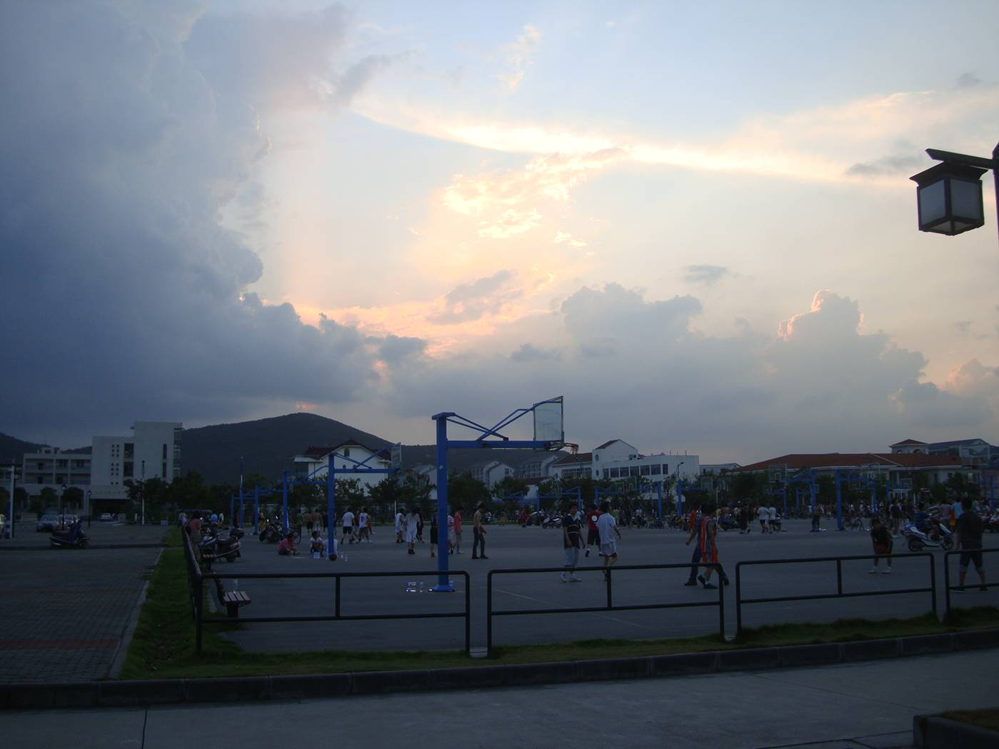 picture:  Thunder clouds over the basketball court and a dramatic sky.  Jiangnan University, Wuxi, China