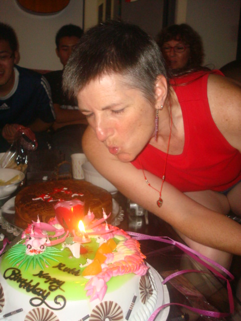 Ruth blows out the candles.