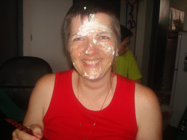 Apparently this is another Chinese tradition.  The birthday girl gets smeared.