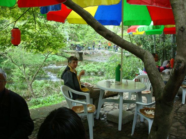Ruth Anderson sipping tea, Wuxie Scenic Area,  Zhejiang Province, China