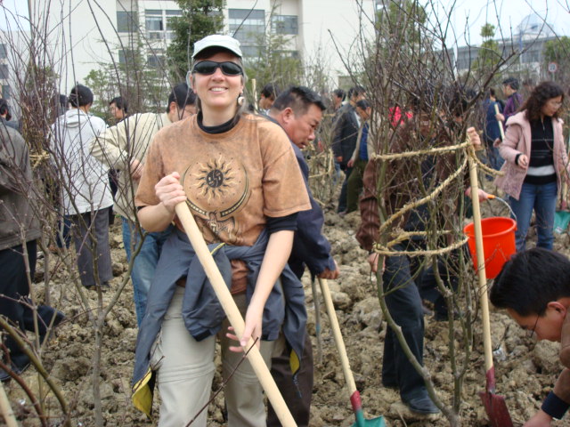 Ruth plants trees.  Tree Day at Jiangnan University,  Wuxi,  China